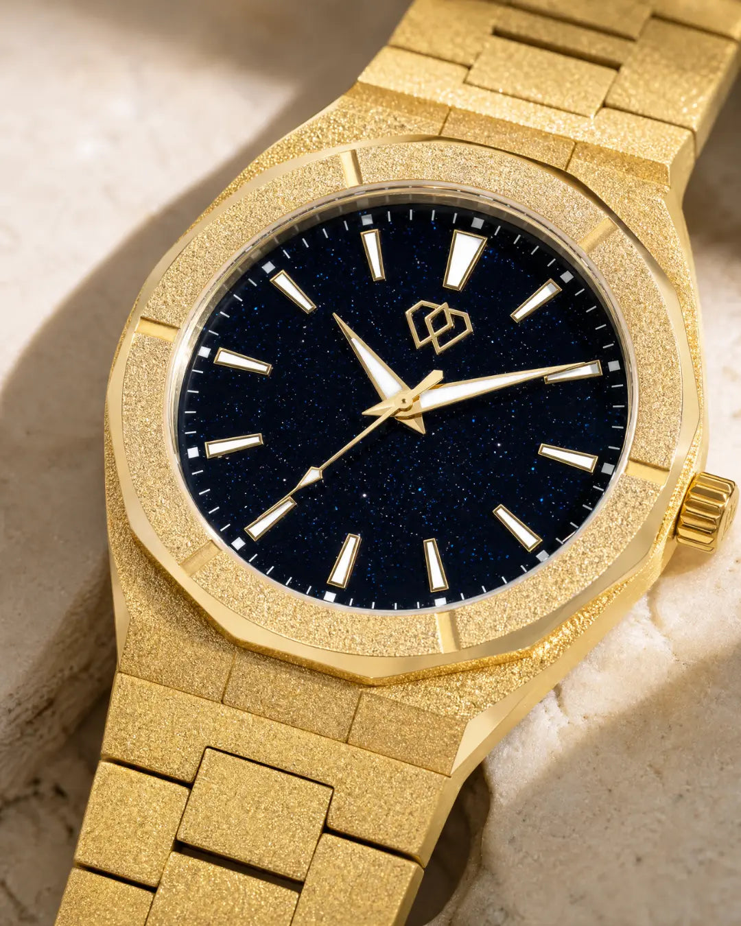 Frosted gold watch detail
